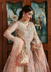 Luxury unstitched Kanwal Malik Mehar outfit in jewel tones featuring intricate embroidery and organza dupatta.